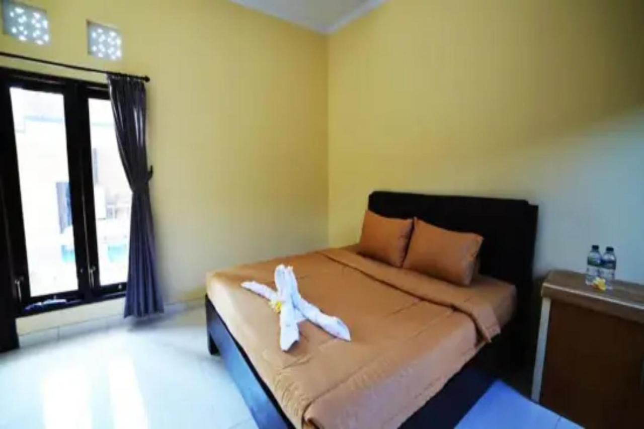 Oyo Flagship 91237 Ratu Guest House Kedunganan Ngoại thất bức ảnh
