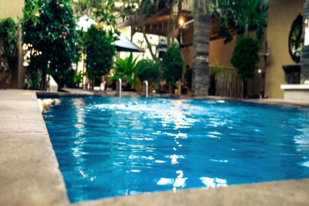 Oyo Flagship 91237 Ratu Guest House Kedunganan Ngoại thất bức ảnh