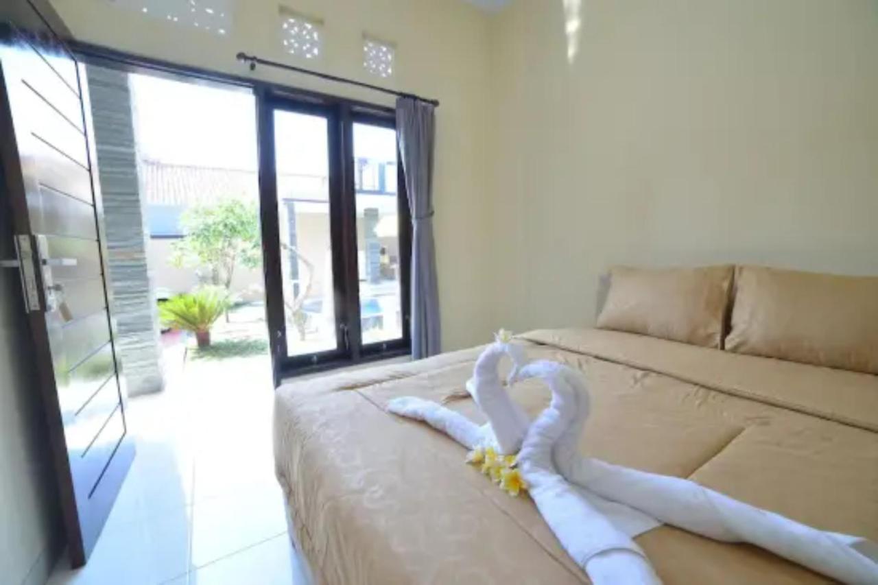 Oyo Flagship 91237 Ratu Guest House Kedunganan Ngoại thất bức ảnh