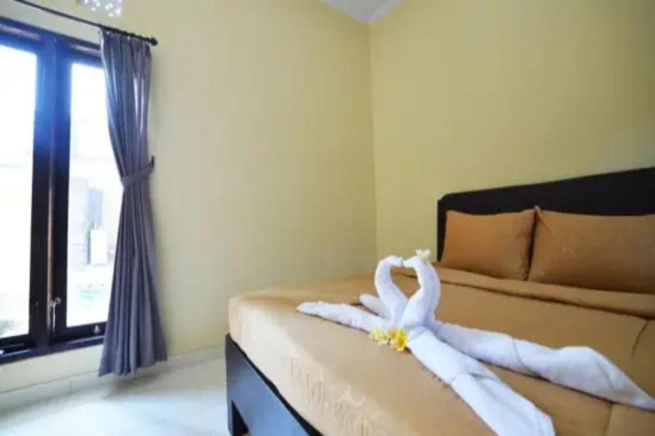 Oyo Flagship 91237 Ratu Guest House Kedunganan Ngoại thất bức ảnh