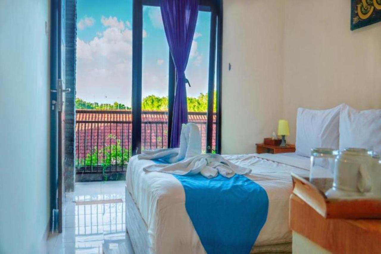 Oyo Flagship 91237 Ratu Guest House Kedunganan Ngoại thất bức ảnh